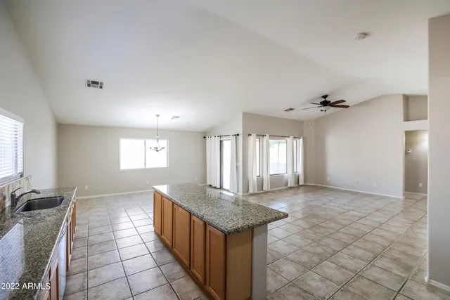 a view of entryway with kitchen