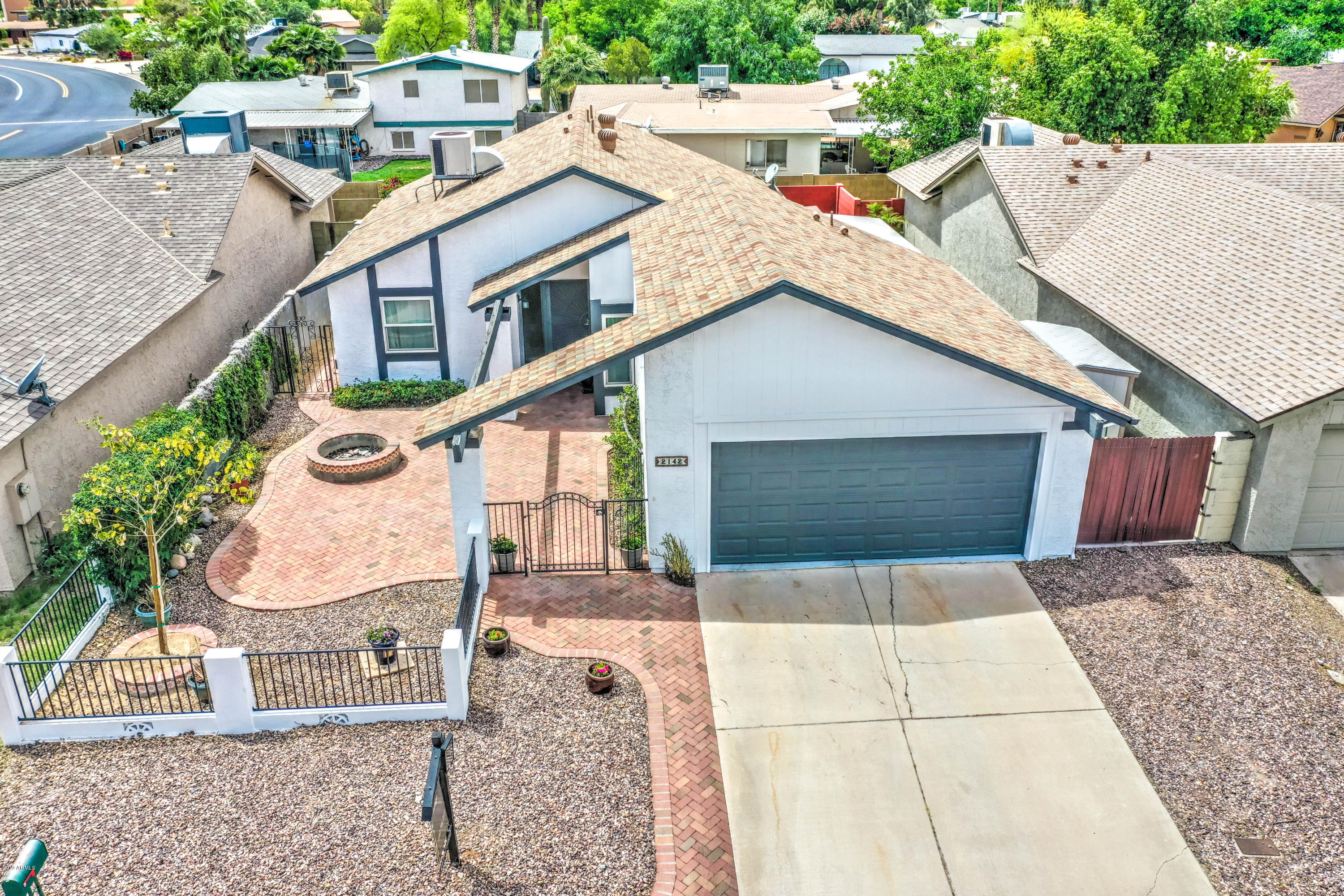 2142 West Inlet Loop Mesa, AZ 85202 - Photo 21 of 70 a view of a house with a patio