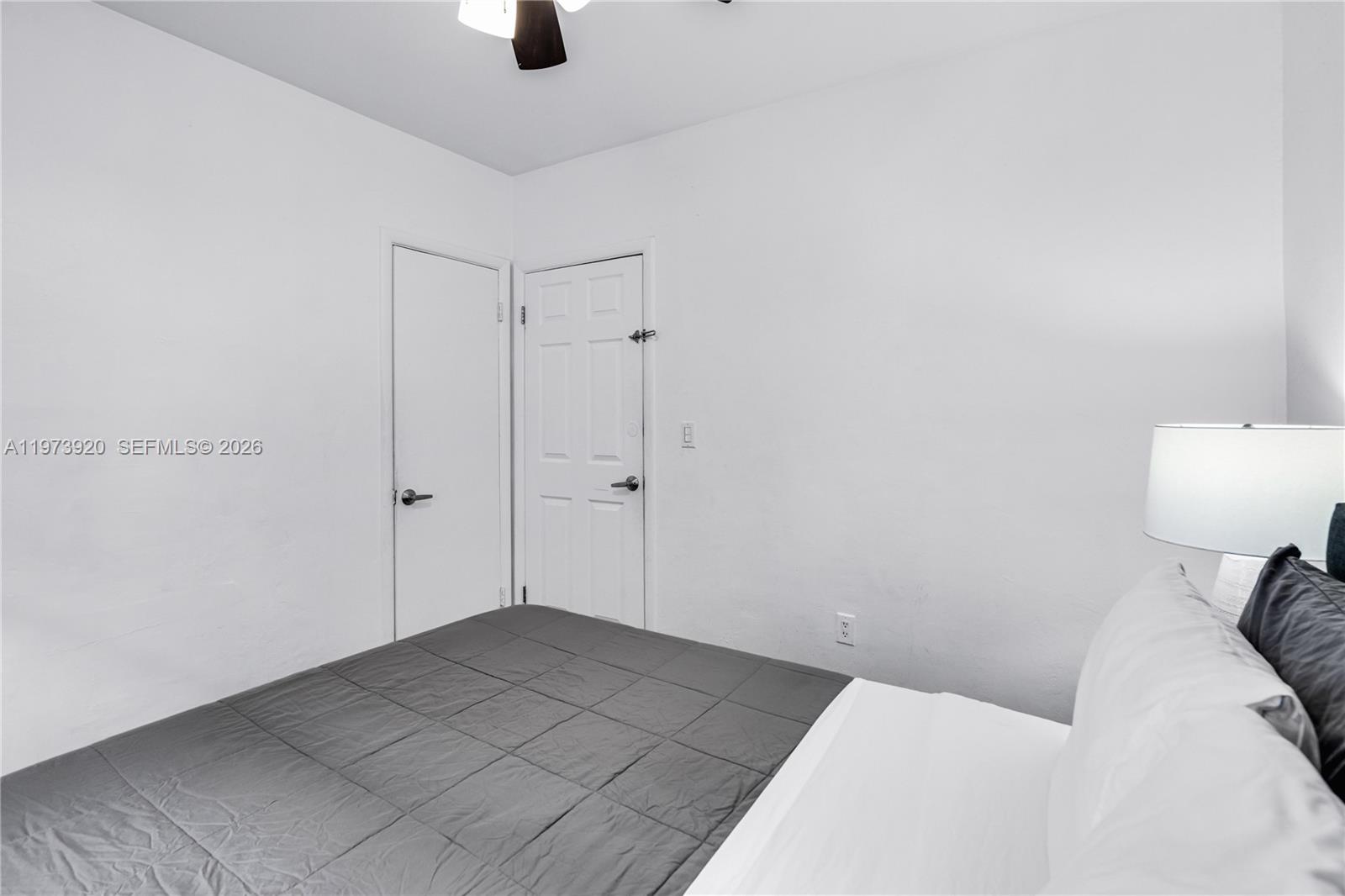 977 Southwest 10th Street, Unit 927 Miami, FL 33130 - Photo 15 of 18 a view of a room that has a sink and a toilet in it