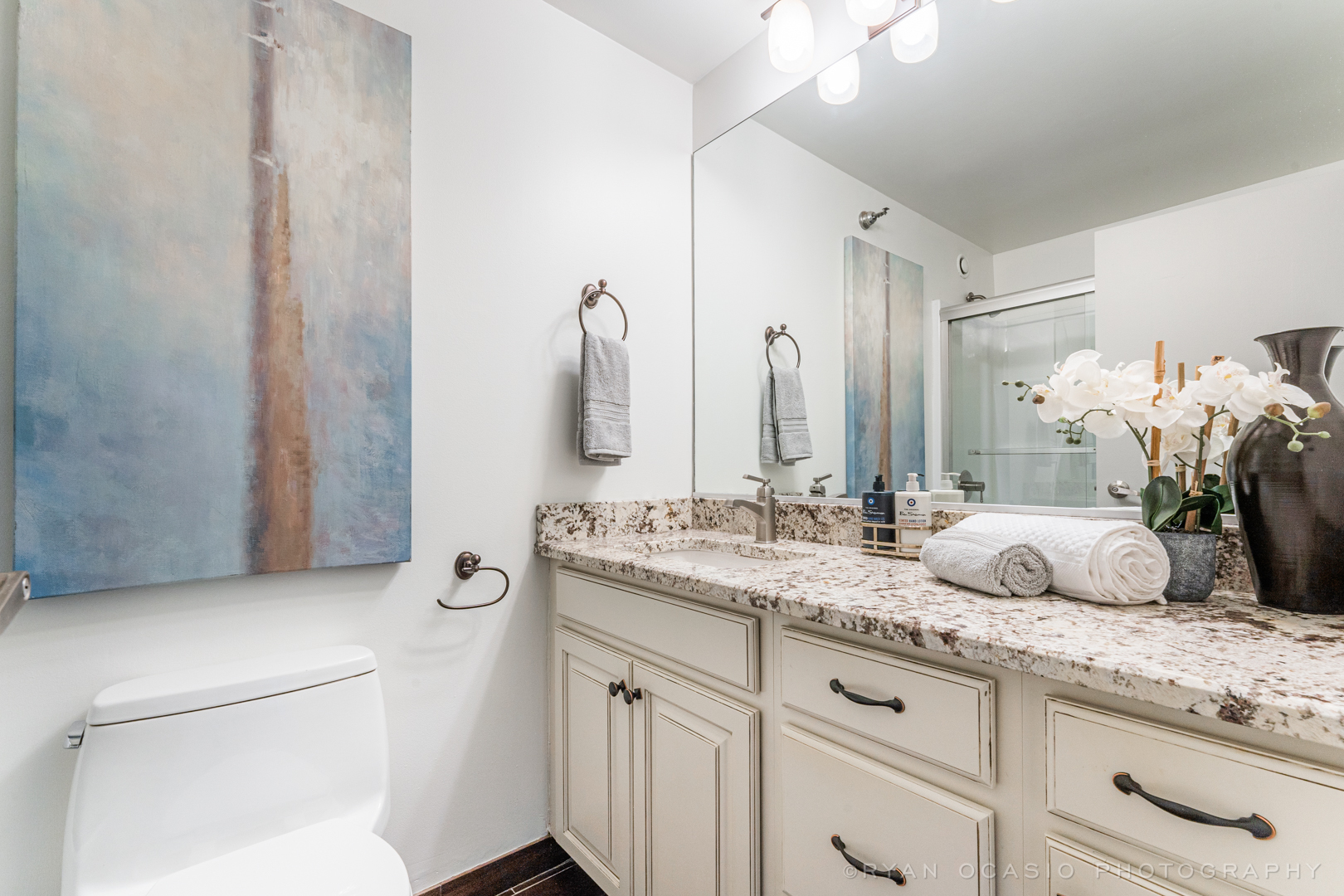 70 West Huron Street, Unit 2005 Chicago, IL 60654 - Photo 11 of 18 a bathroom with a double vanity sink and a mirror