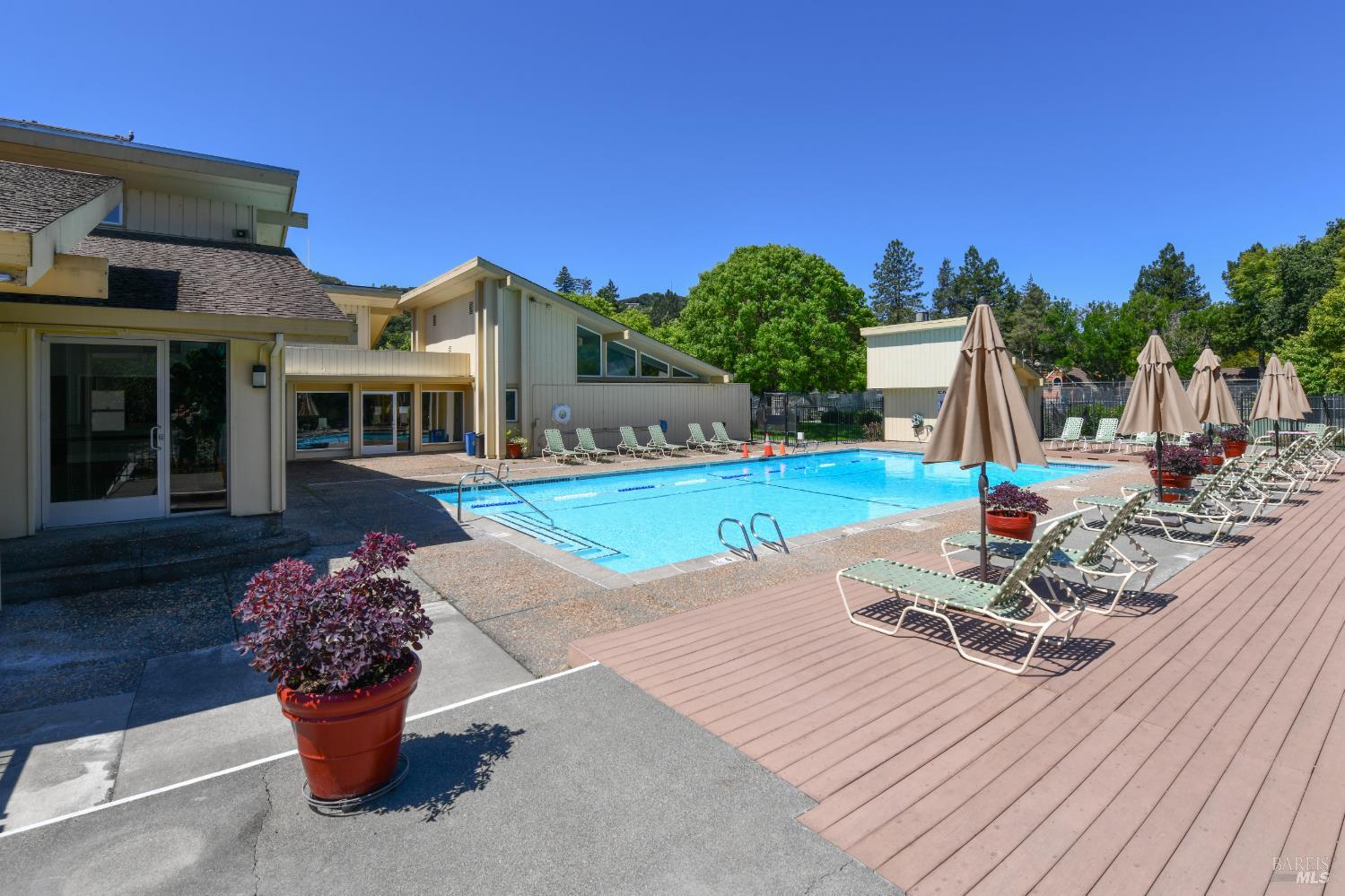 3007 Loma Court Santa Rosa, CA 95405 - Photo 34 of 43 Community center pool with loungers and tables