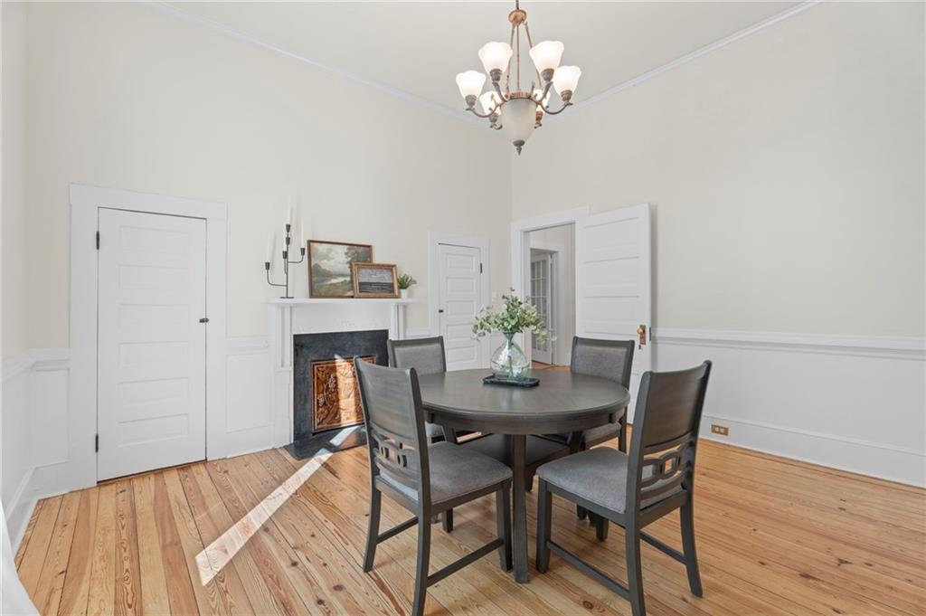114 Cleveland Street McDonough, GA 30253 - Photo 25 of 71 a view of a dining room with furniture and wooden floor
