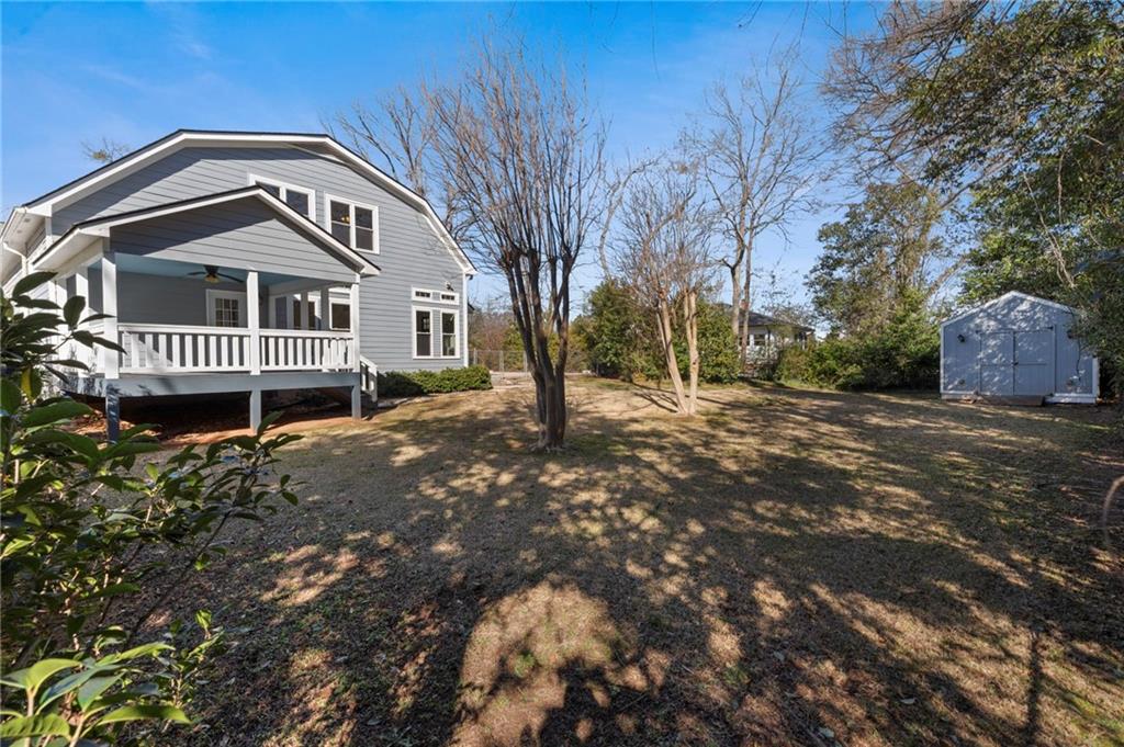 114 Cleveland Street McDonough, GA 30253 - Photo 56 of 71 a front view of a house with a garden