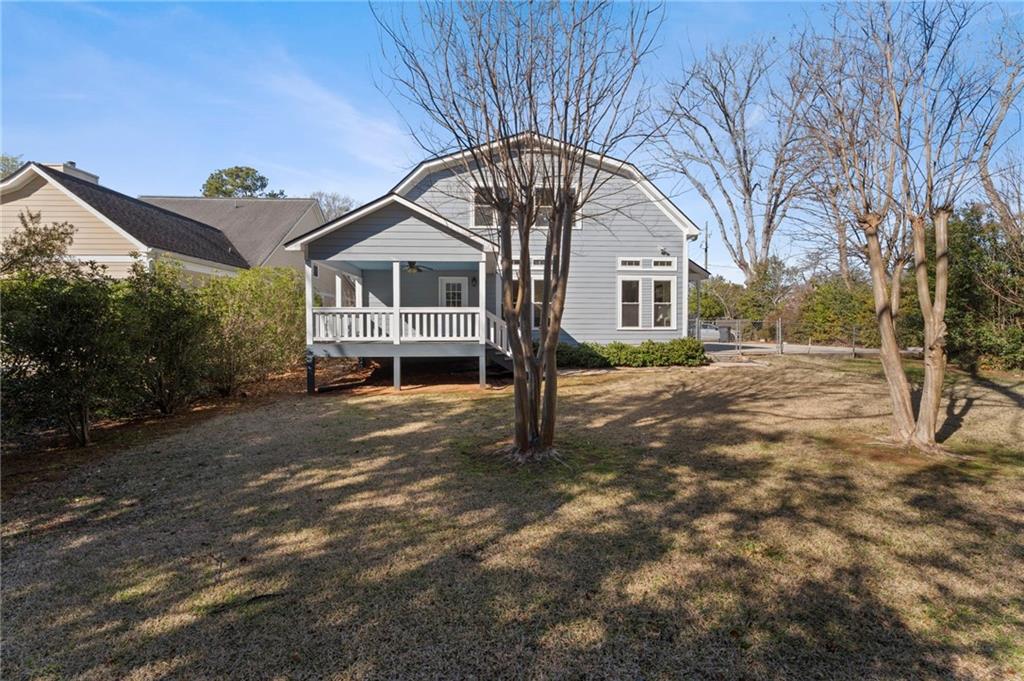 114 Cleveland Street McDonough, GA 30253 - Photo 57 of 71 a front view of a house with a garden