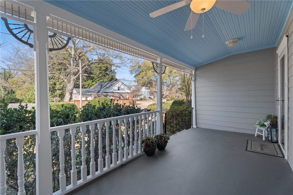 114 Cleveland Street McDonough, GA 30253 - Photo 7 of 71 a view of a porch with wooden floor and outdoor space