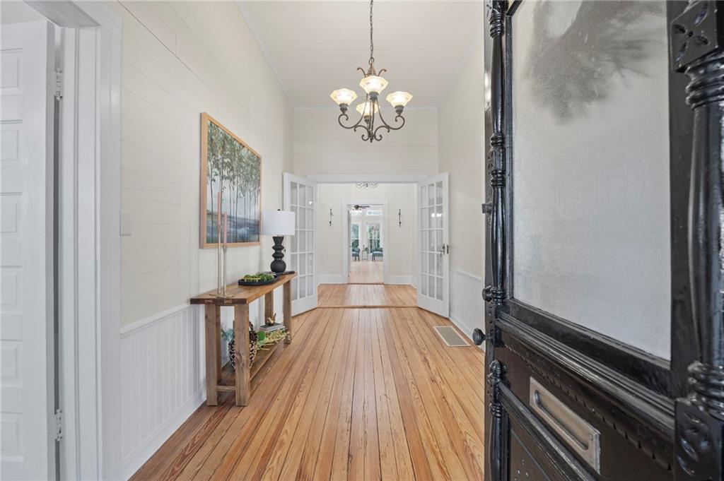 114 Cleveland Street McDonough, GA 30253 - Photo 8 of 71 a view of a room with wooden floor and staircase