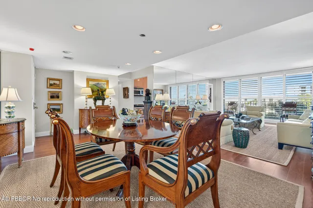 a view of a dining room with furniture and a livingroom