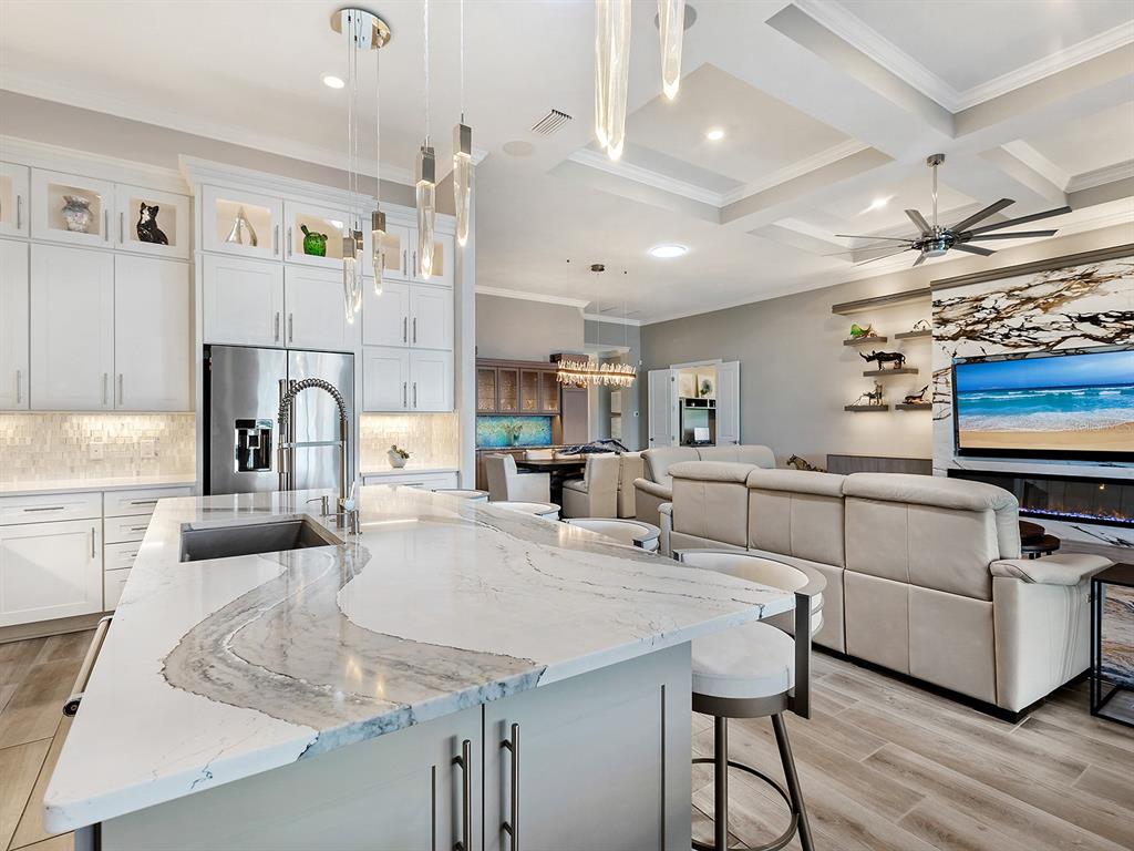 17807 Eastbrook Terrace Lakewood Ranch, FL 34202 - Photo 30 of 92 a kitchen with stainless steel appliances granite countertop a sink counter space and cabinets