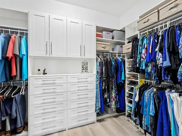 an aerial view of a house with a lake view