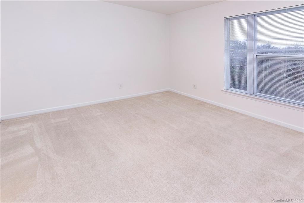 618 Raphael Place Charlotte, NC 28205 - Photo 14 of 15 an empty room with a window