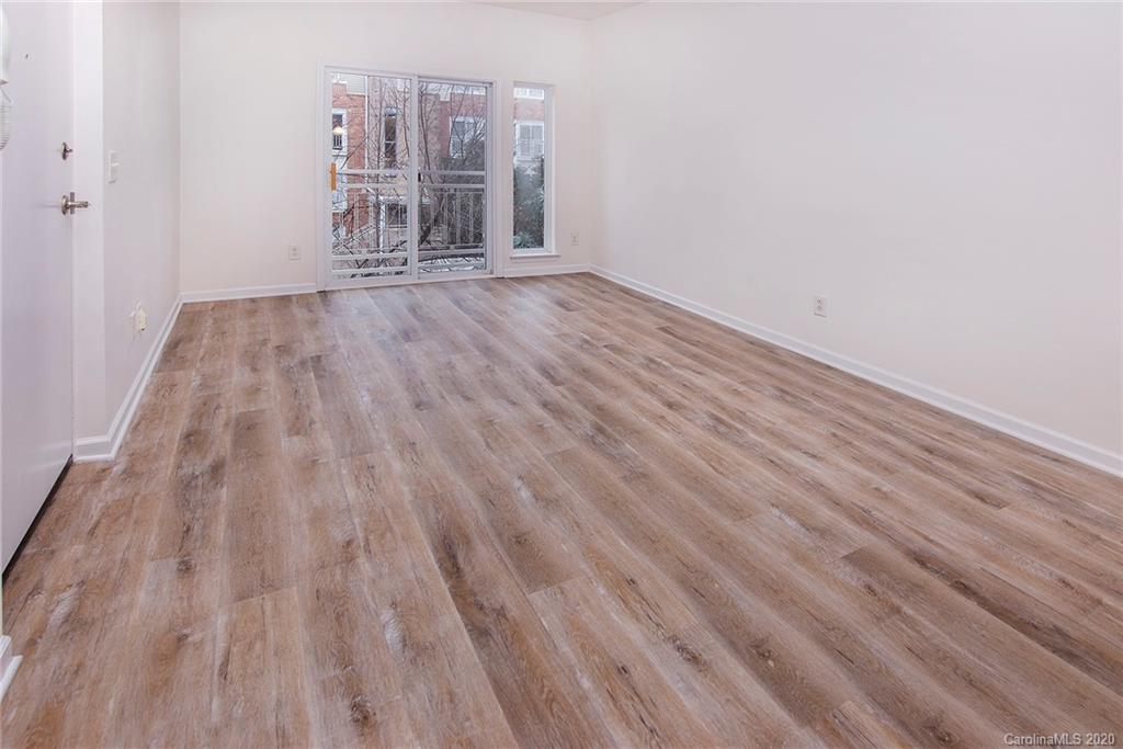 618 Raphael Place Charlotte, NC 28205 - Photo 3 of 15 a view of empty room with wooden floor