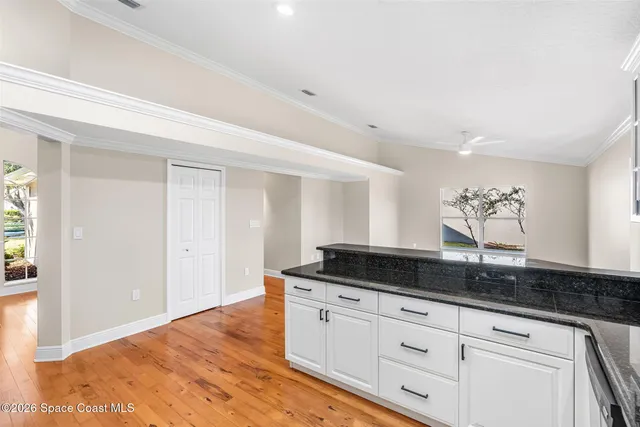 a bedroom with a large bed and a couch