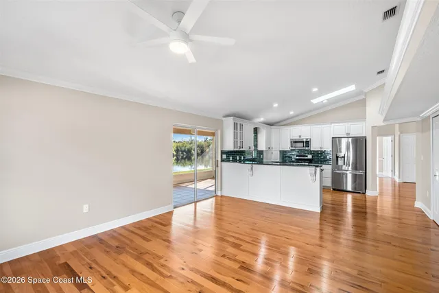 a bathroom with a bath tub and shower