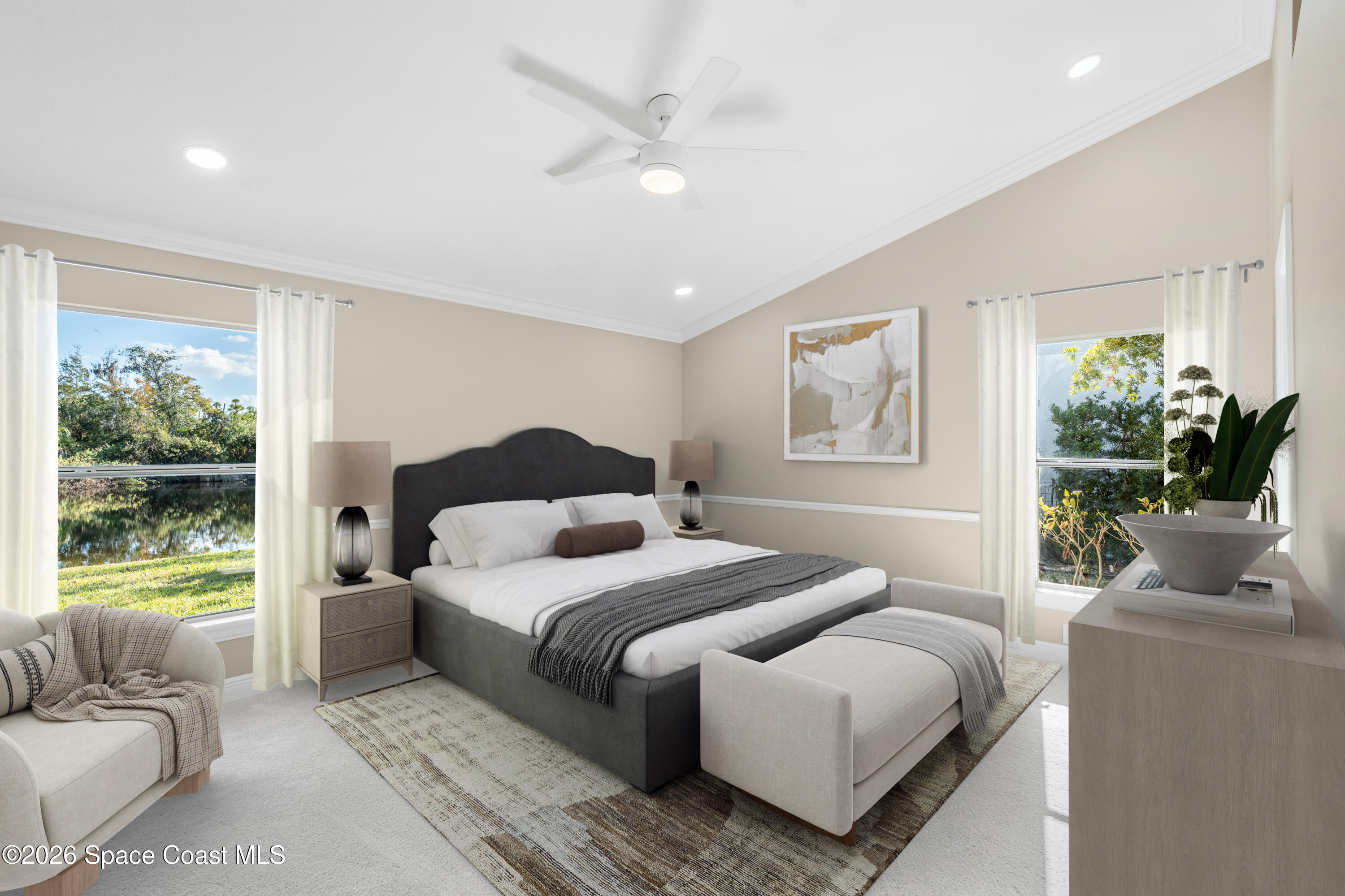 8033 Kingswood Way Melbourne, FL 32940 - Photo 31 of 70 a bedroom with a large bed and a couch