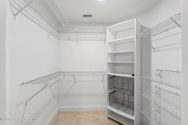 a view of a swimming pool with an outdoor space and seating area