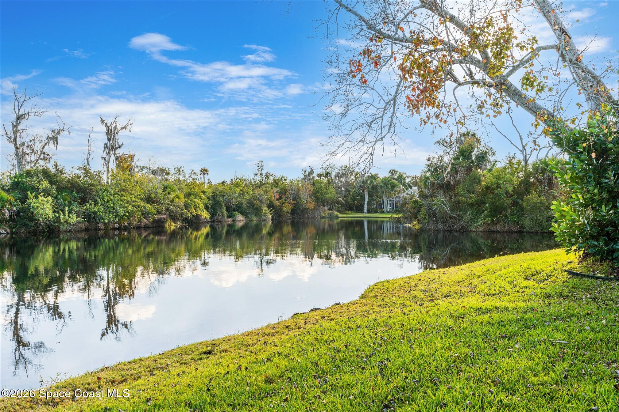 8033 Kingswood Way Melbourne, FL 32940 - Photo 54 of 70 a view of a lake