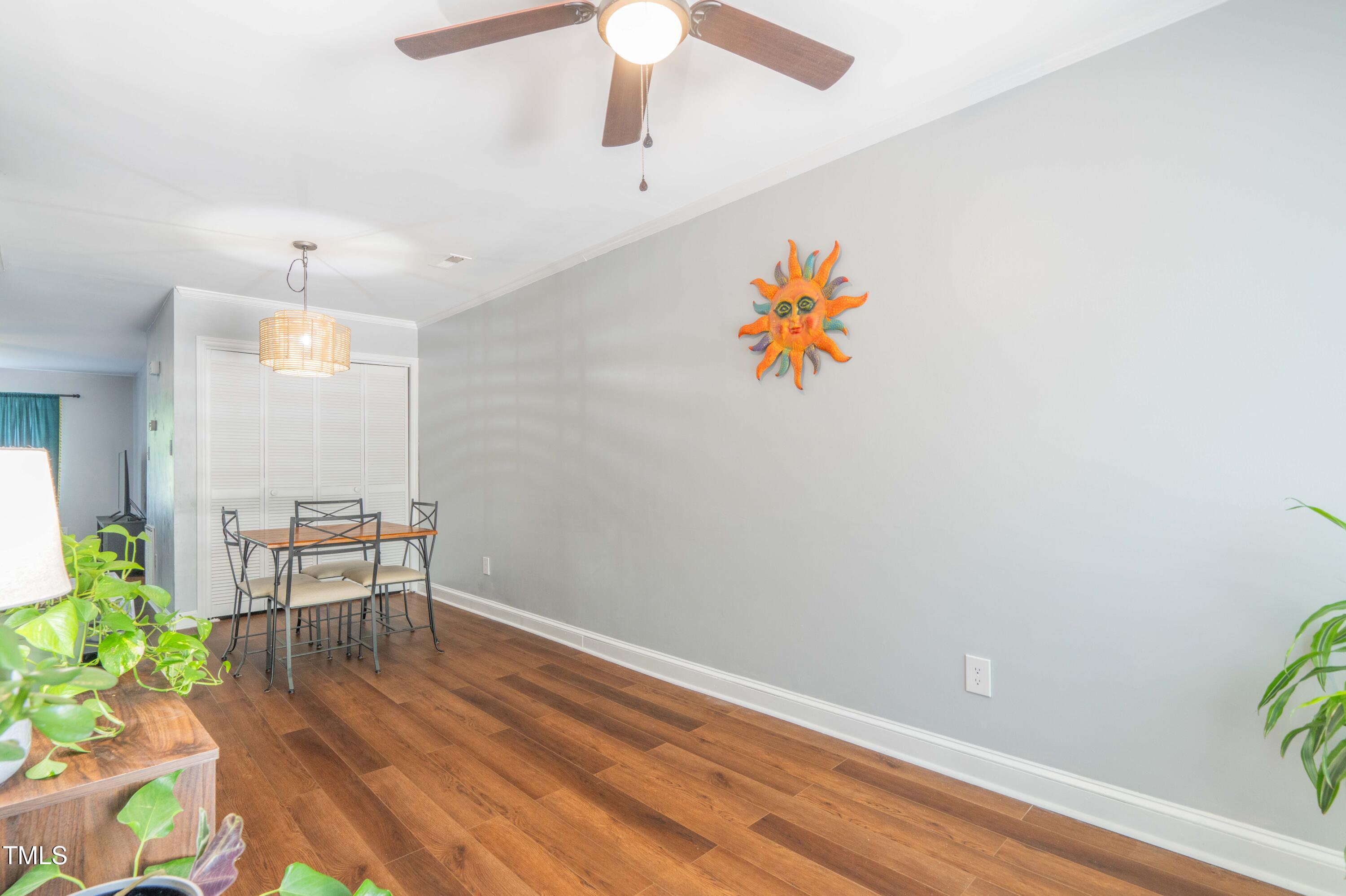 1316 Garden Crest Circle Raleigh, NC 27609 - Photo 10 of 46 a workspace with furniture and wooden floor