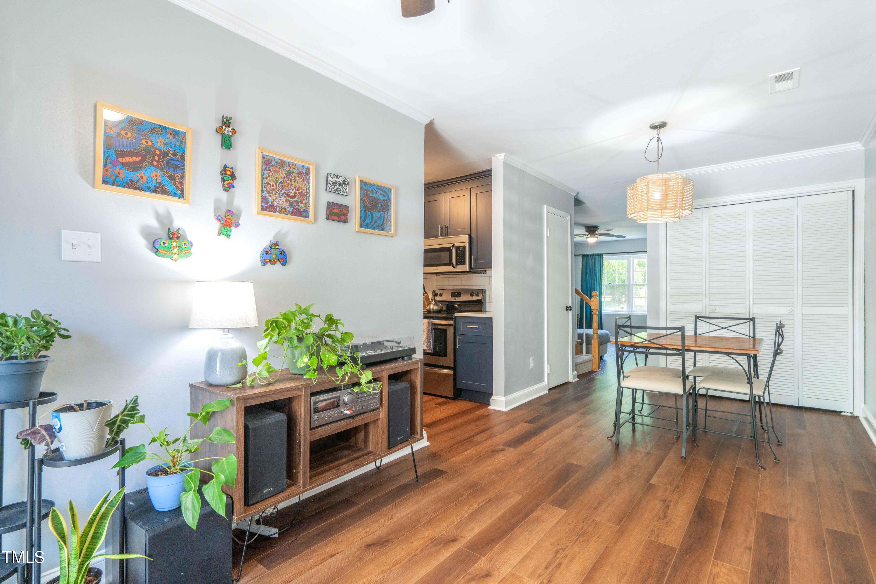 1316 Garden Crest Circle Raleigh, NC 27609 - Photo 12 of 46 a living room with furniture and a fireplace