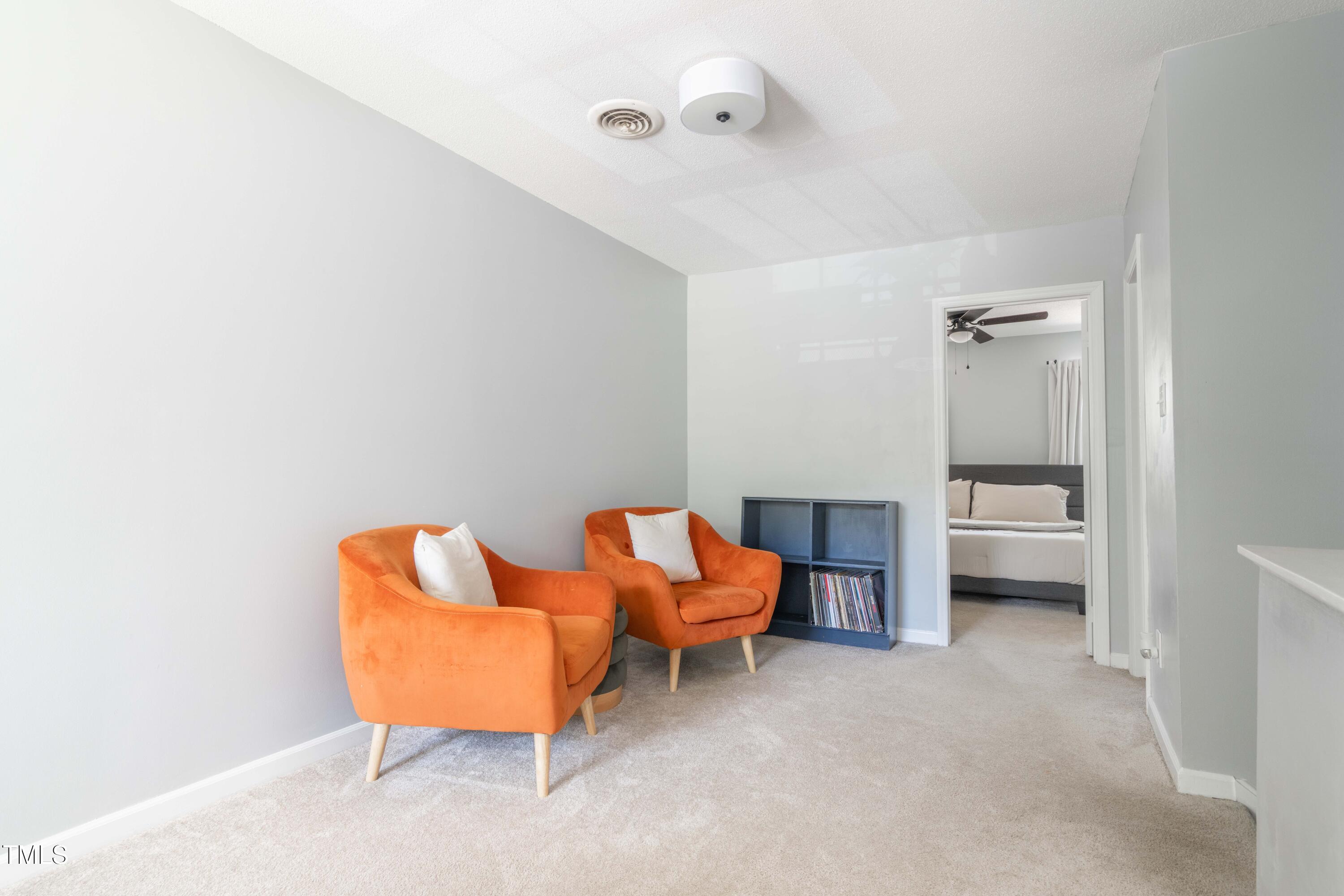 1316 Garden Crest Circle Raleigh, NC 27609 - Photo 31 of 46 a living room with furniture and a table