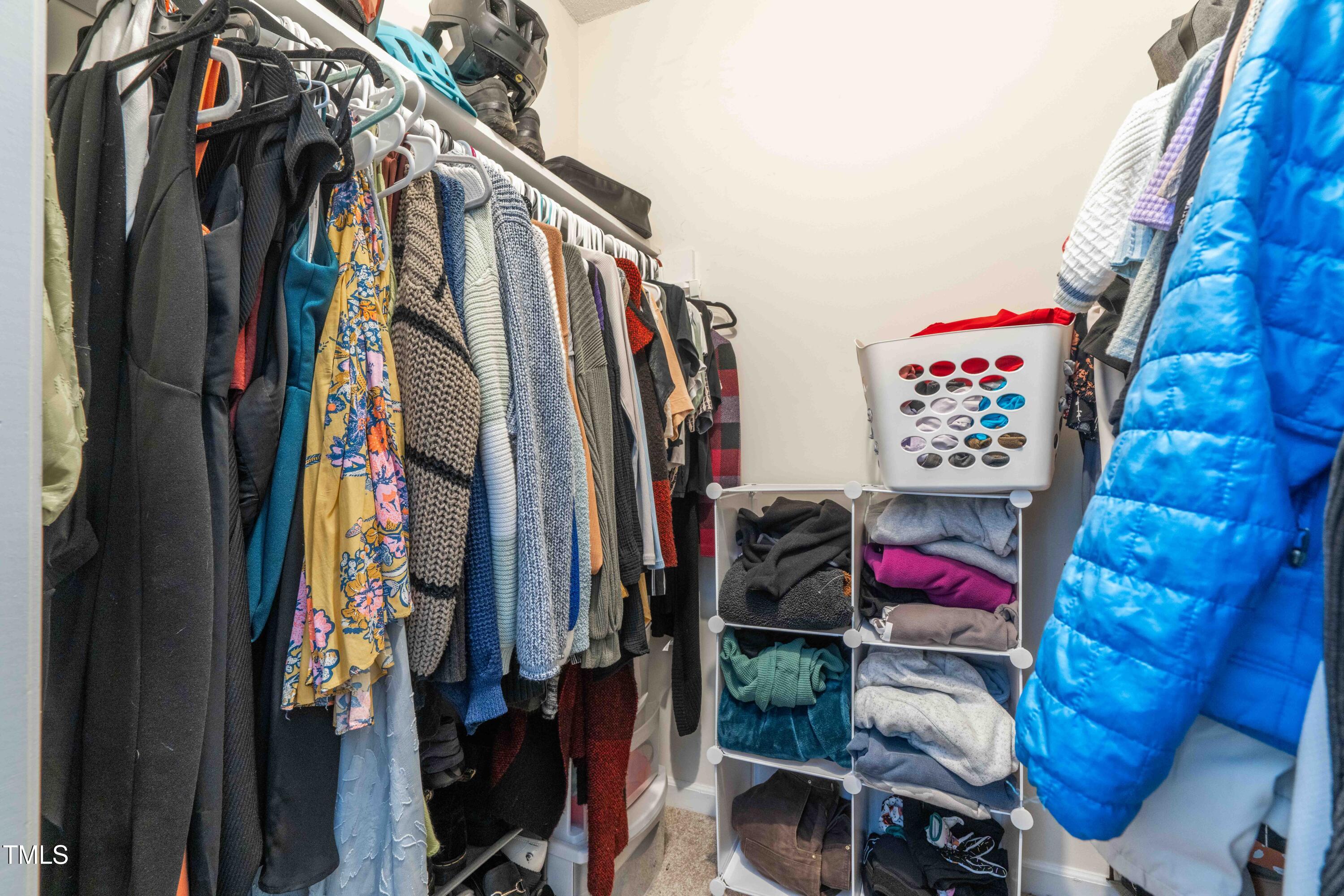 1316 Garden Crest Circle Raleigh, NC 27609 - Photo 39 of 46 a view of walk in closet with clothes and shoes