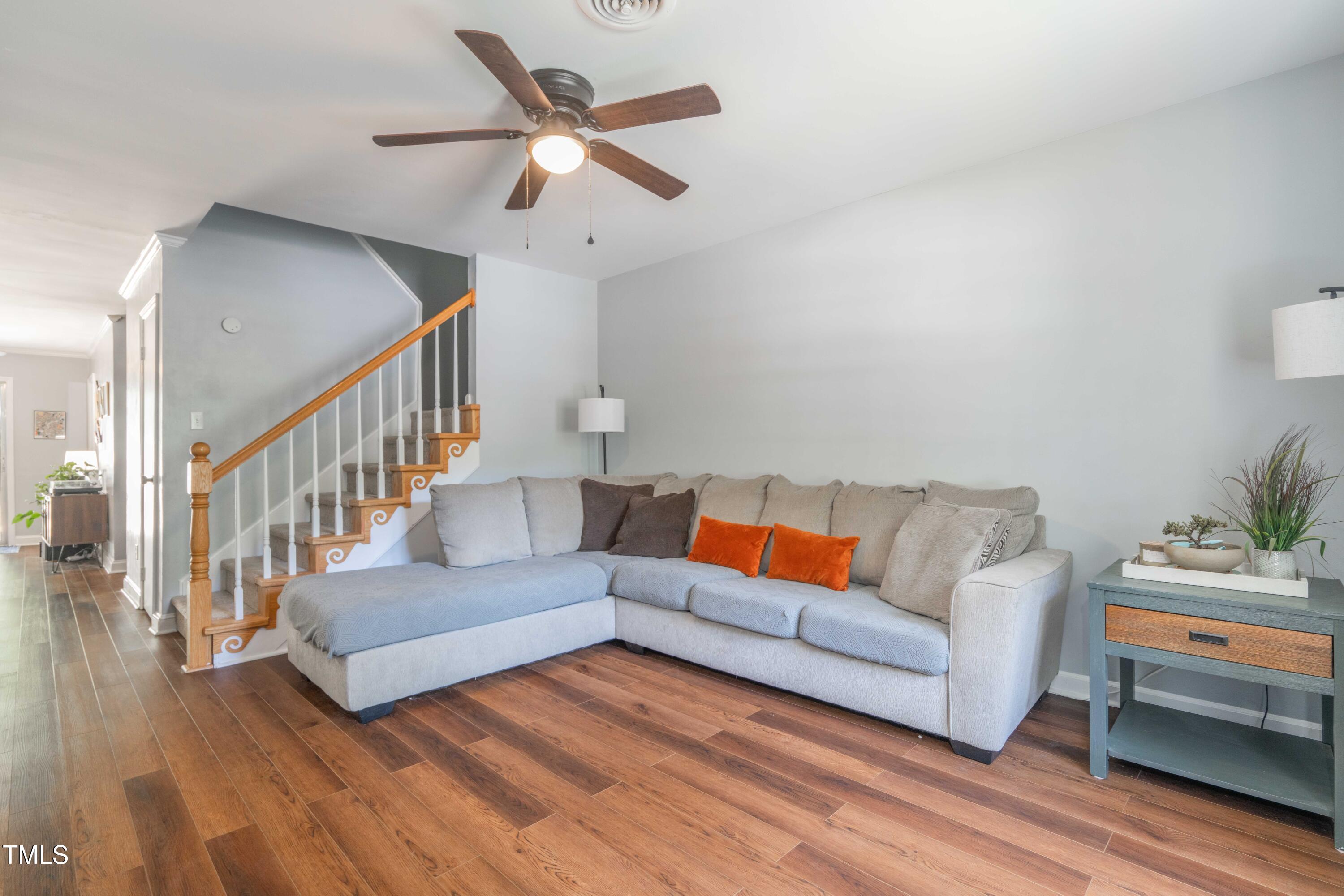 1316 Garden Crest Circle Raleigh, NC 27609 - Photo 4 of 46 a living room with furniture and a ceiling fan