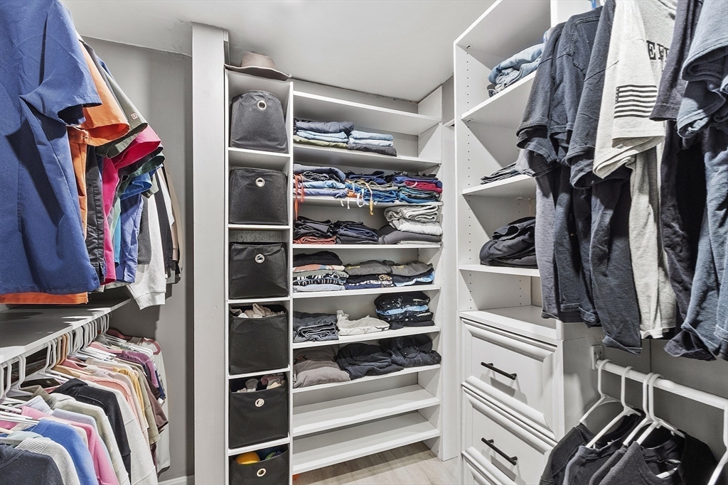 8 Country Road Lunenburg, MA 01462 - Photo 28 of 42 a view of walk in closet with clothes and shoes