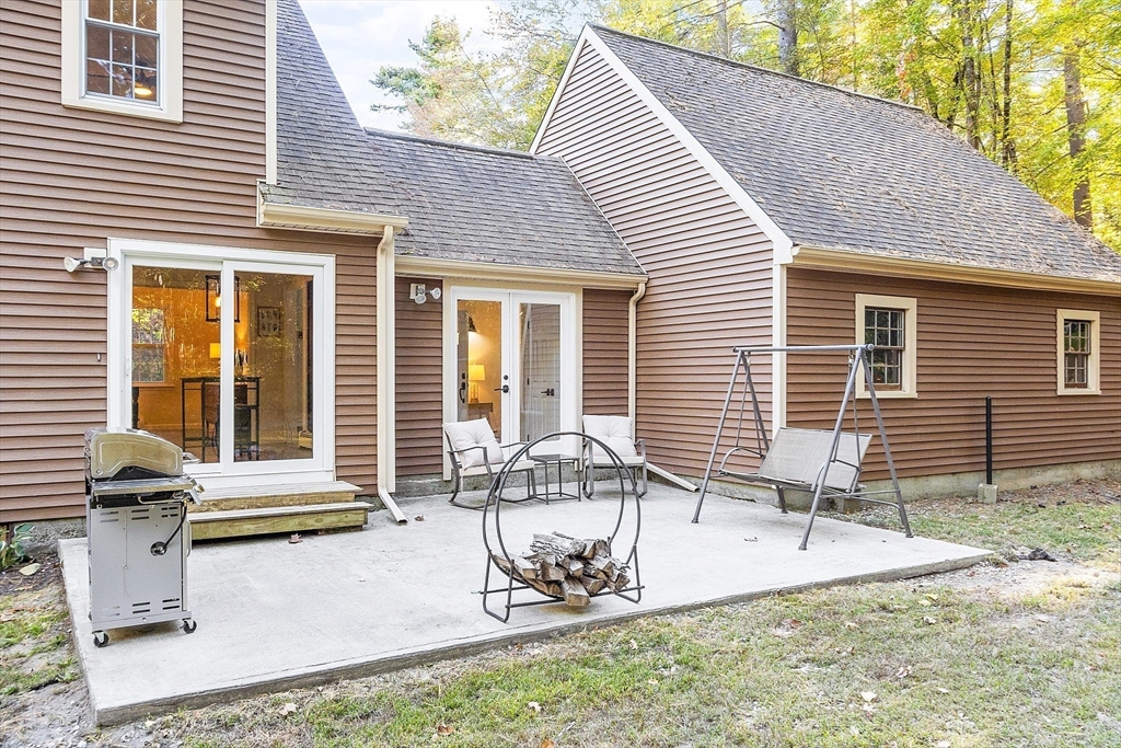 8 Country Road Lunenburg, MA 01462 - Photo 4 of 42 a view of a house with backyard and sitting area