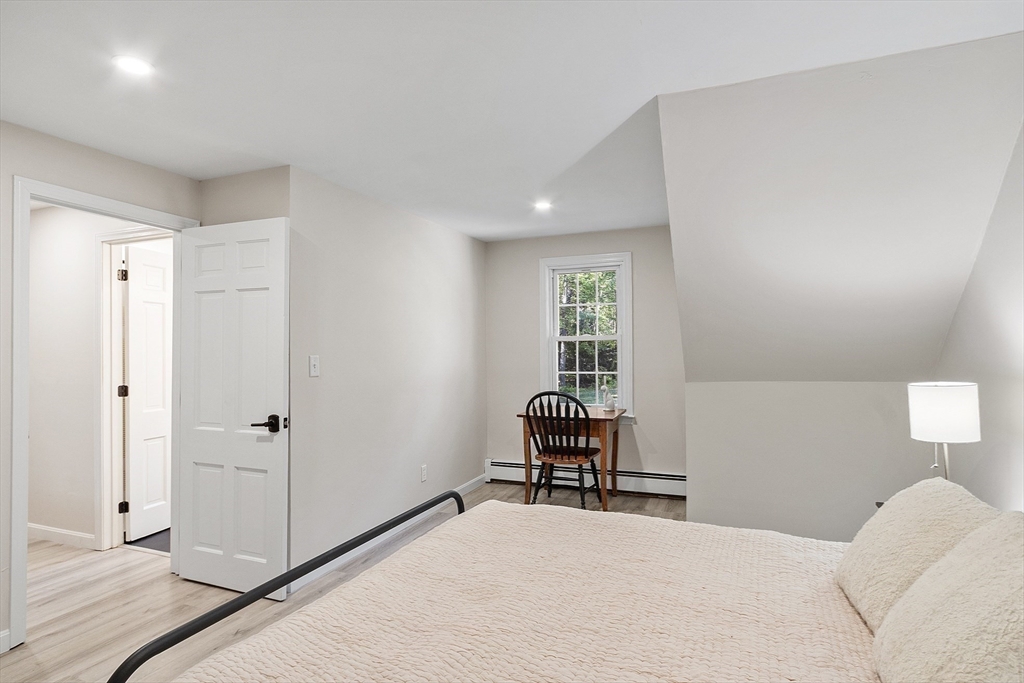 8 Country Road Lunenburg, MA 01462 - Photo 10 of 42 a bedroom with a bed and a window