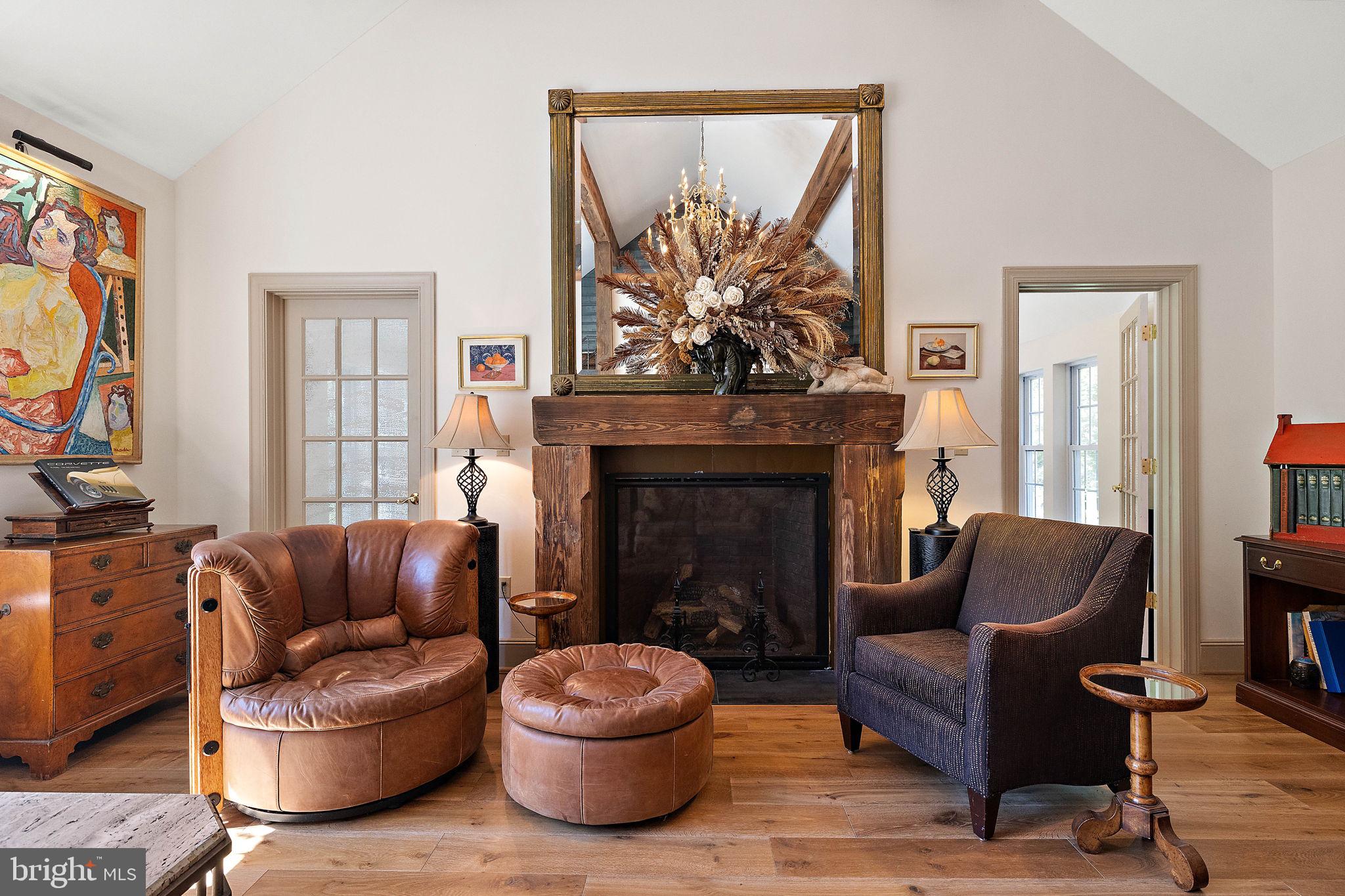 126 Ridge Road Chadds Ford, PA 19317 - Photo 11 of 64 a living room with furniture and a fireplace