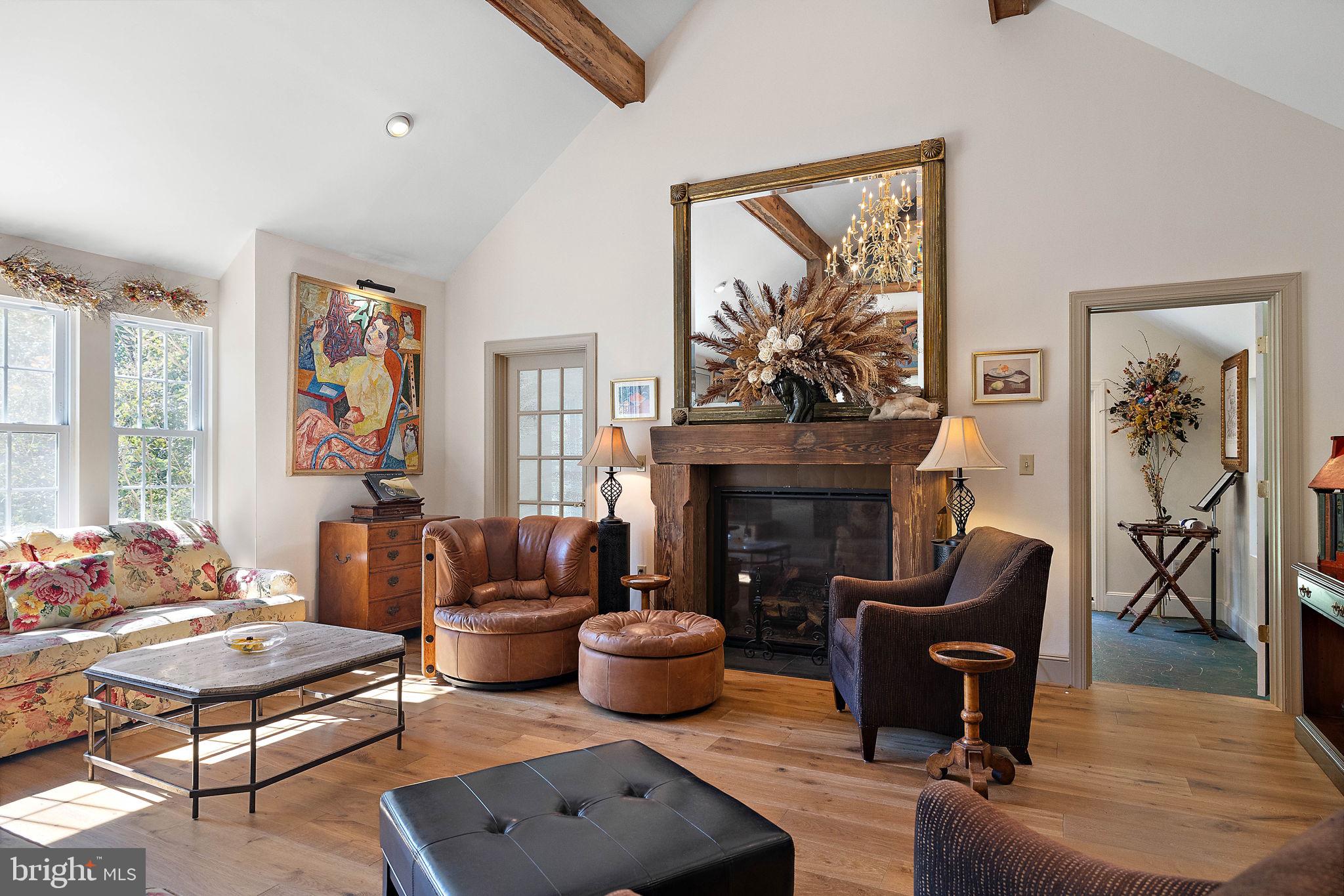 126 Ridge Road Chadds Ford, PA 19317 - Photo 12 of 64 a living room with furniture a fireplace and a large window
