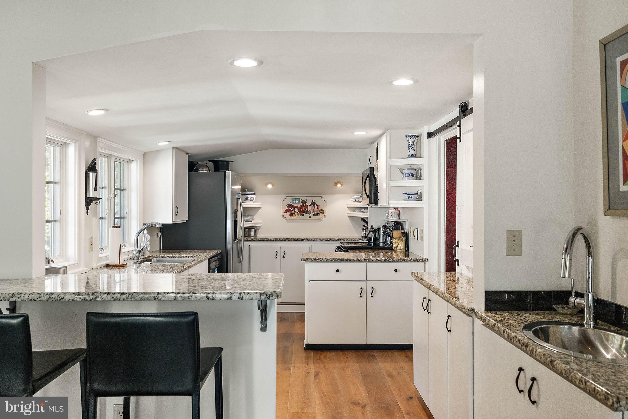 126 Ridge Road Chadds Ford, PA 19317 - Photo 20 of 64 a kitchen with a sink cabinets and window