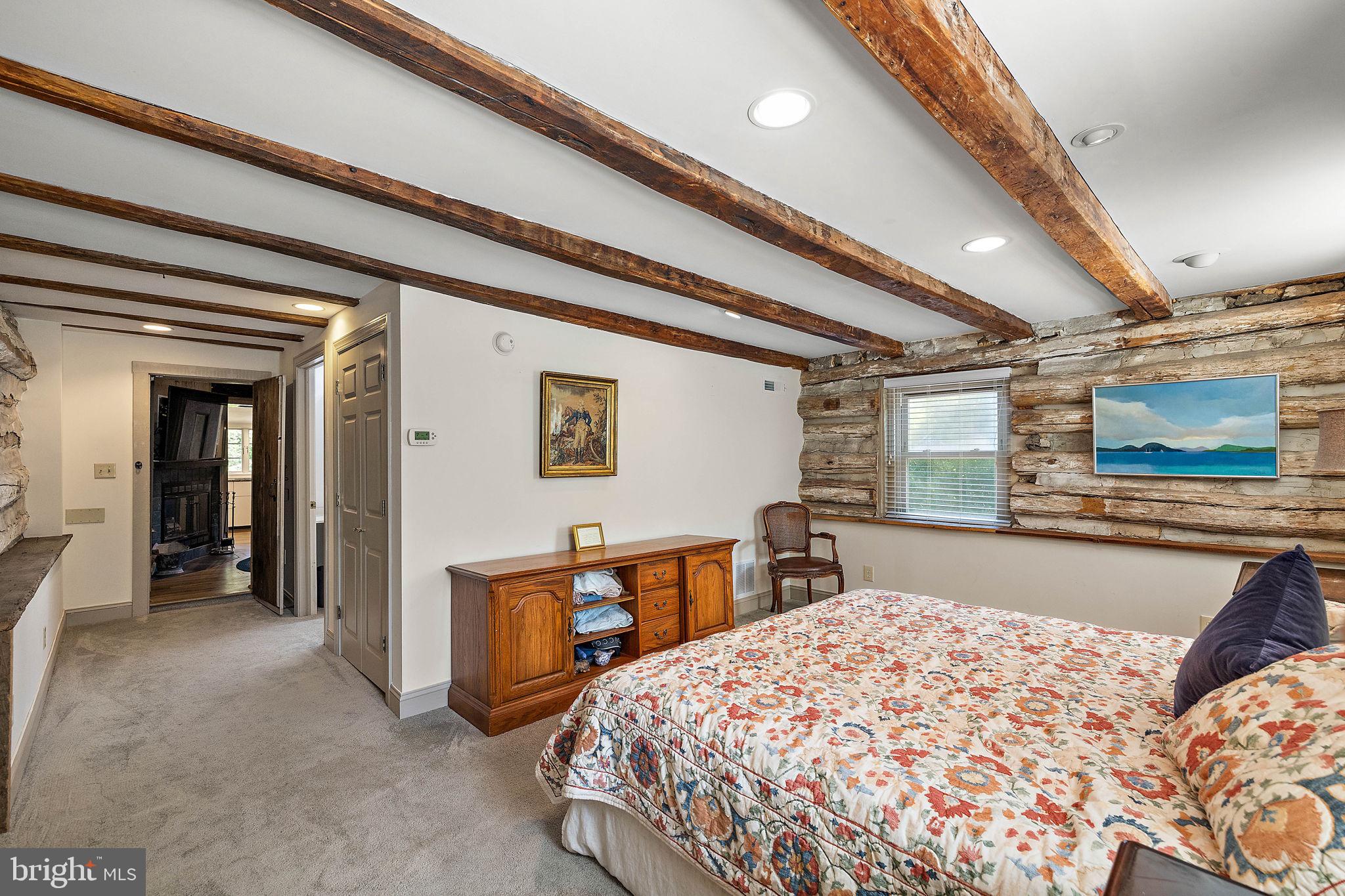 126 Ridge Road Chadds Ford, PA 19317 - Photo 28 of 64 a bedroom with bed and wooden floor