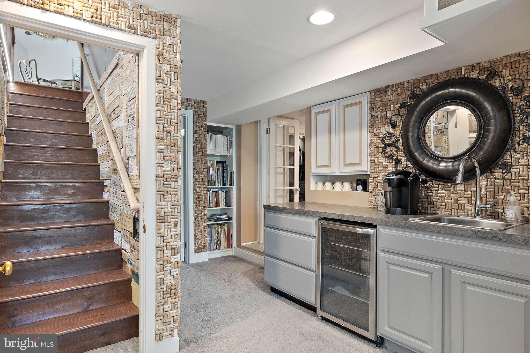 126 Ridge Road Chadds Ford, PA 19317 - Photo 33 of 64 a bathroom with a sink a mirror and a toilet