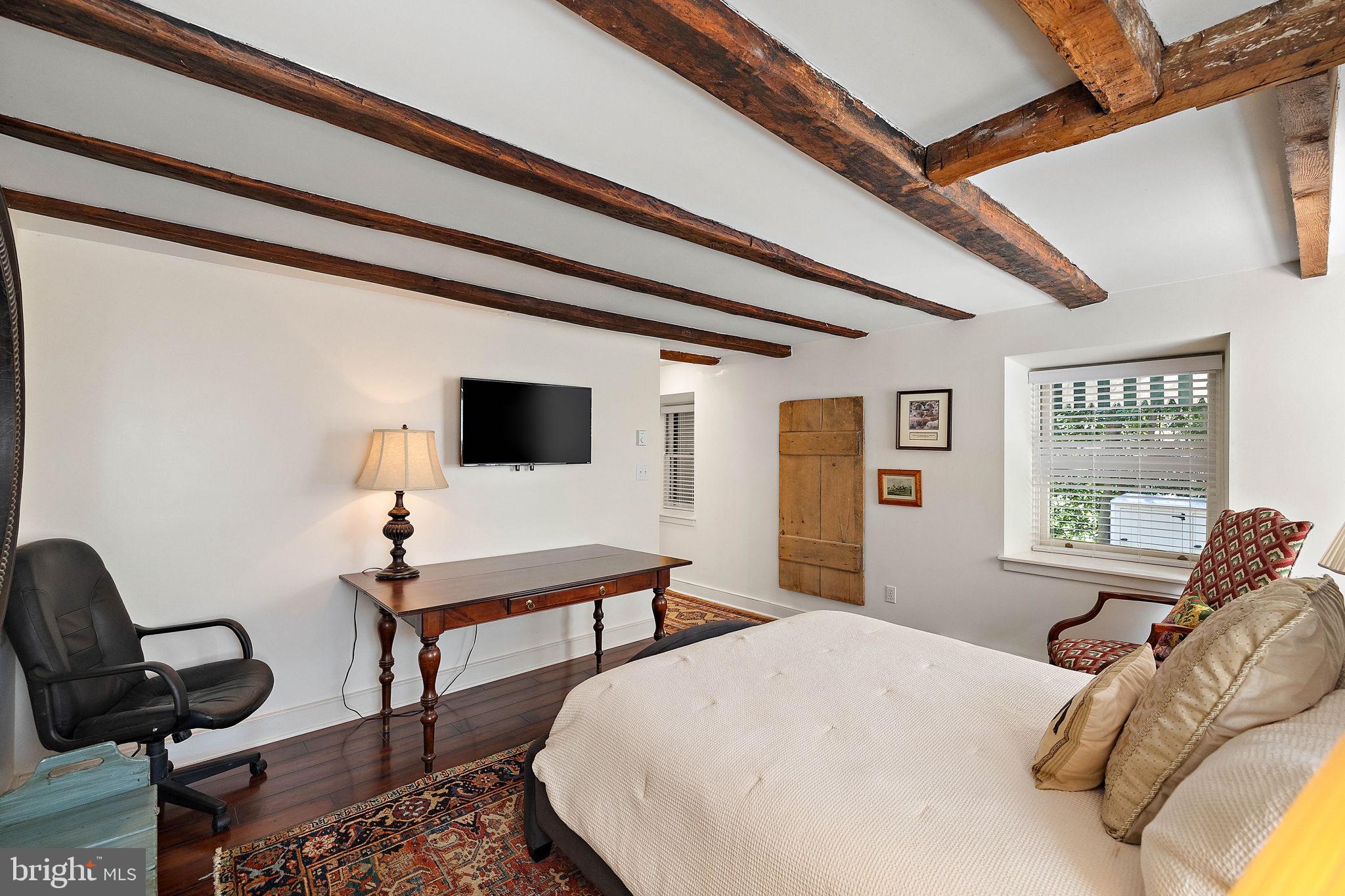 126 Ridge Road Chadds Ford, PA 19317 - Photo 37 of 64 a bedroom with a bed and a window