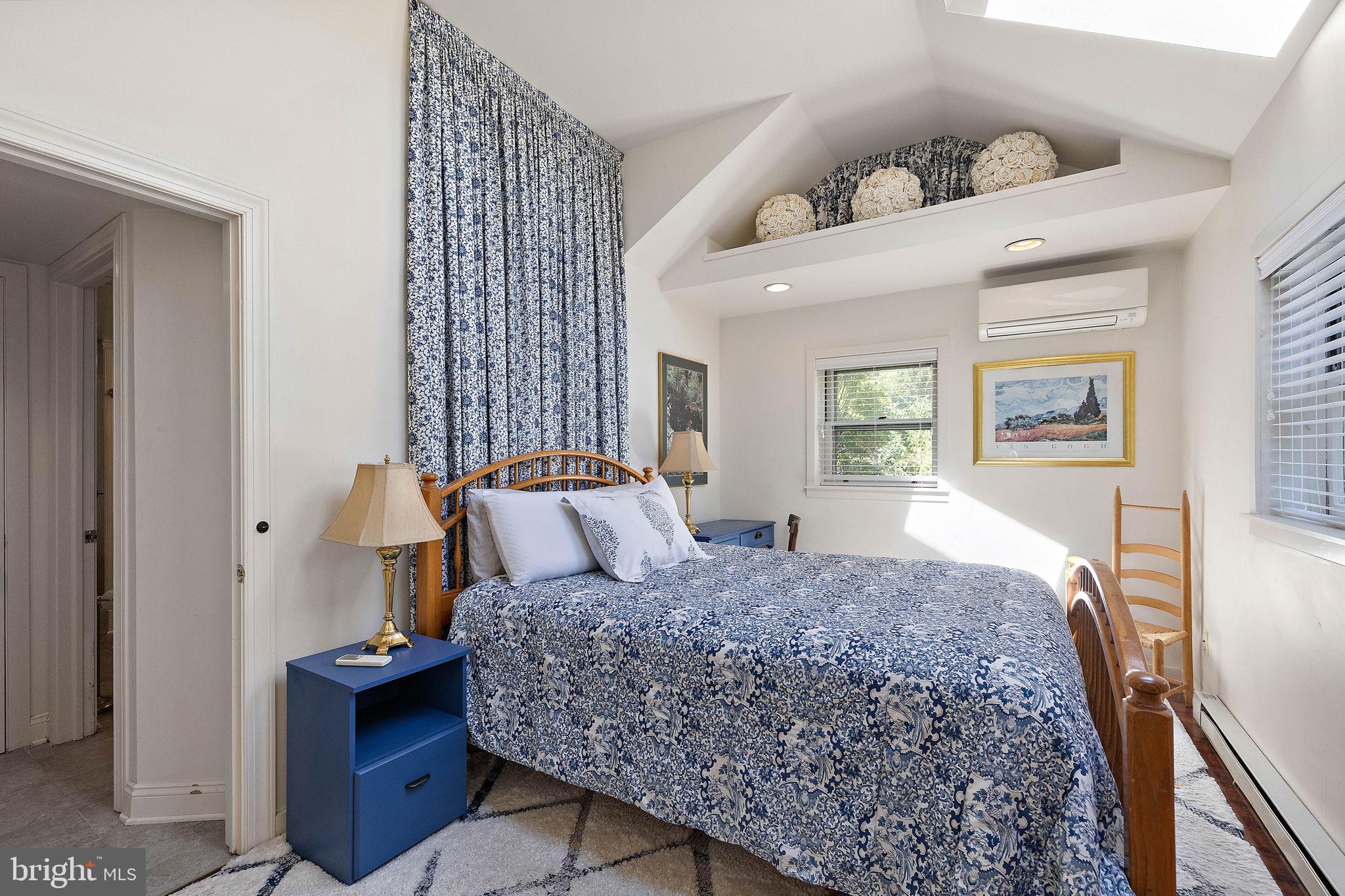 126 Ridge Road Chadds Ford, PA 19317 - Photo 41 of 64 a bedroom with a bed and a dresser with mirror