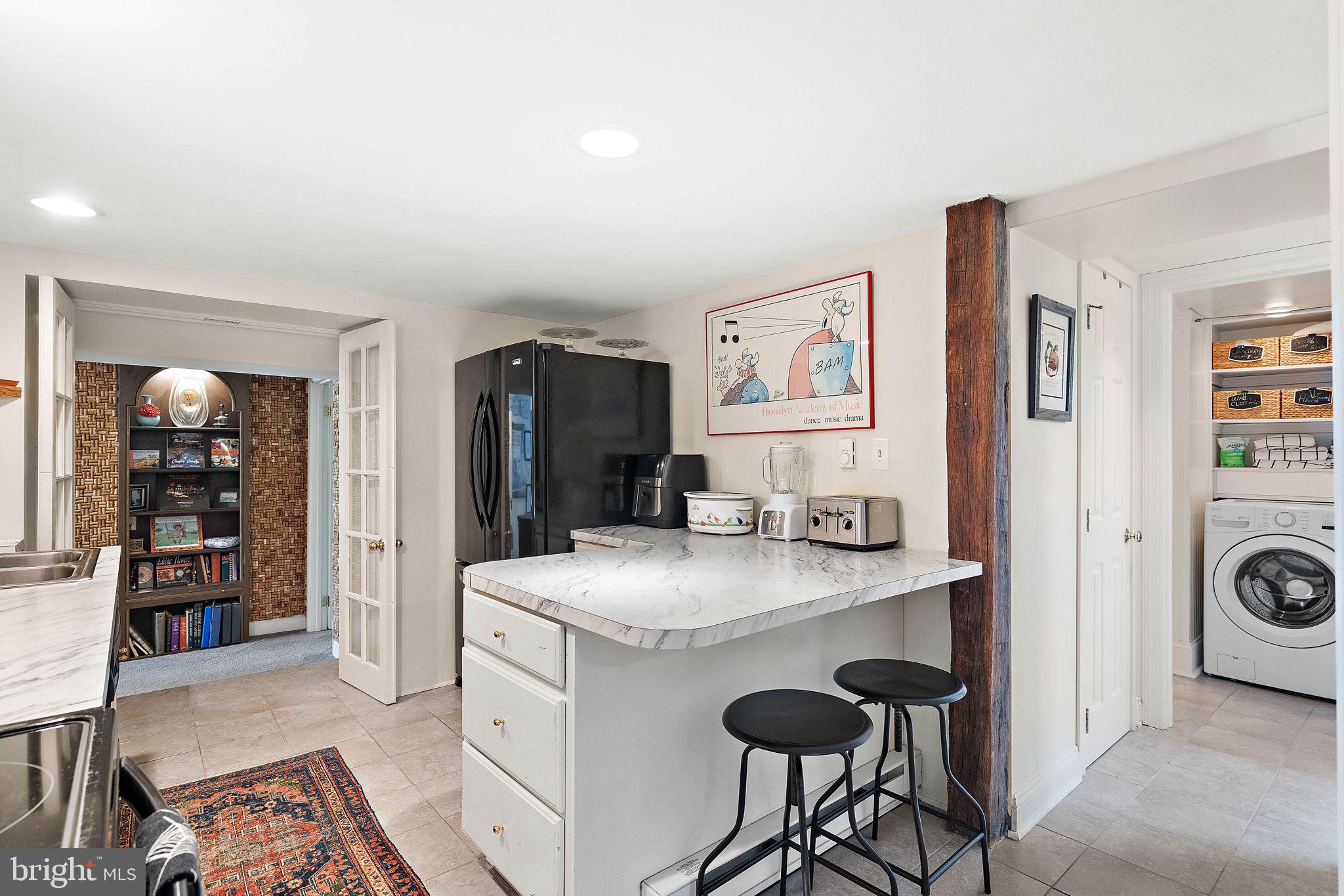 126 Ridge Road Chadds Ford, PA 19317 - Photo 45 of 64 a kitchen with stainless steel appliances granite countertop a refrigerator and a stove top oven