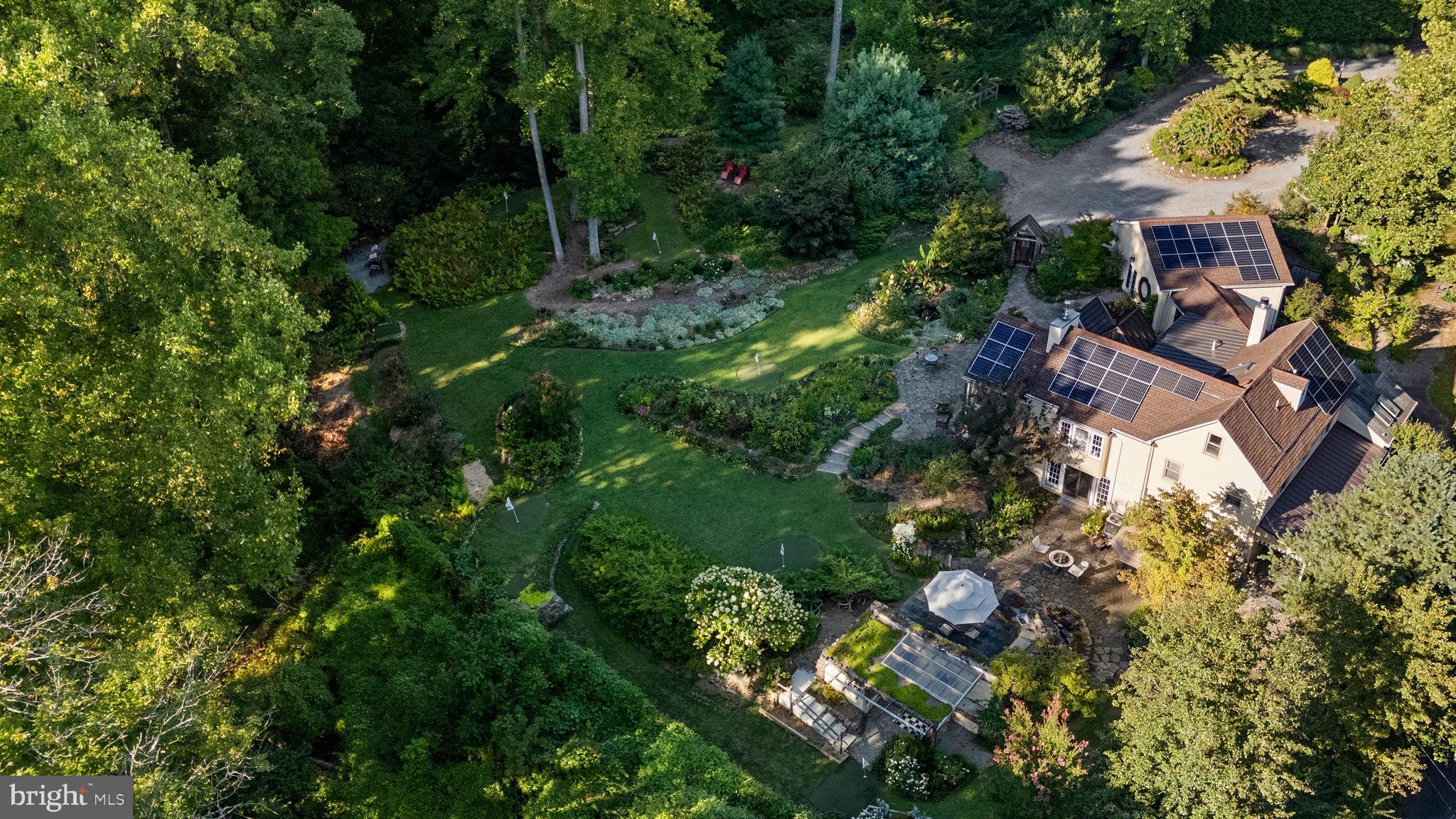 126 Ridge Road Chadds Ford, PA 19317 - Photo 5 of 64 an aerial view of residential house with outdoor space and trees all around