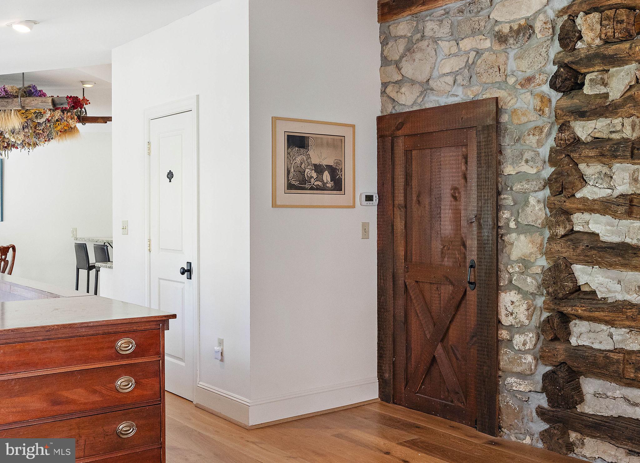 126 Ridge Road Chadds Ford, PA 19317 - Photo 9 of 64 a view of a hallway with wooden floor and closet