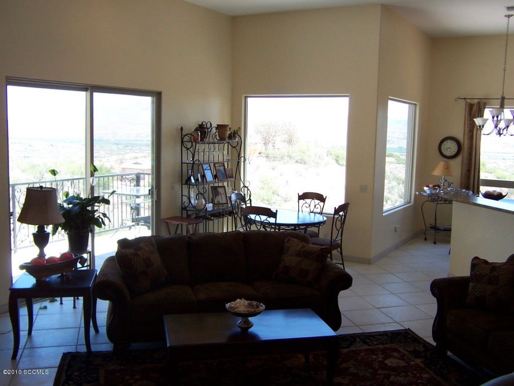 530 Ruth Lane Rio Rico, AZ 85648 - Photo 22 of 36 a living room with furniture and a large window