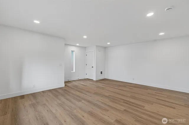a view of storage and utility room with washer and dryer
