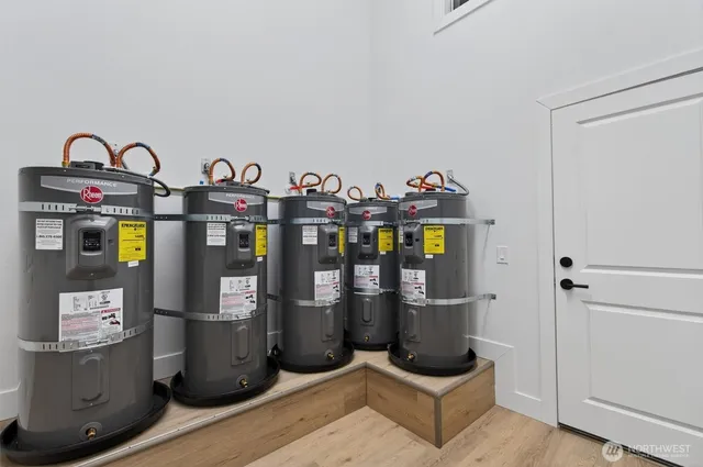 an aerial view of residential building and lake