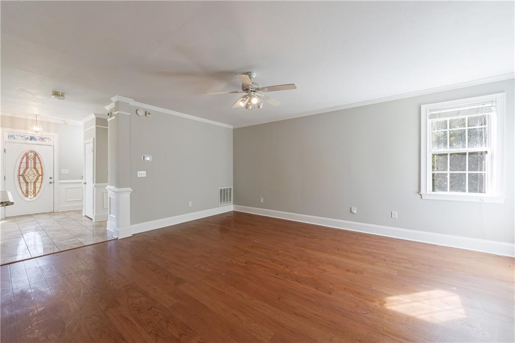 6790 Palace Lane Fairburn, GA 30213 - Photo 20 of 62 wooden floor in an empty room with a window