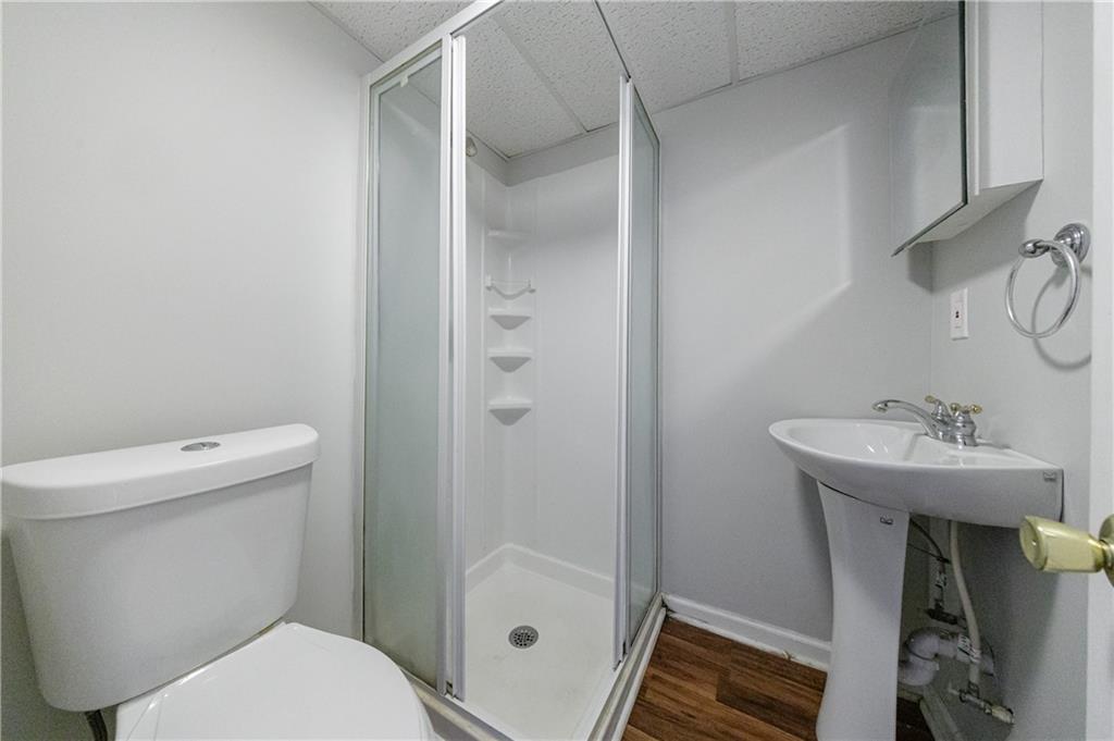 6790 Palace Lane Fairburn, GA 30213 - Photo 52 of 62 a bathroom with a sink a toilet and shower