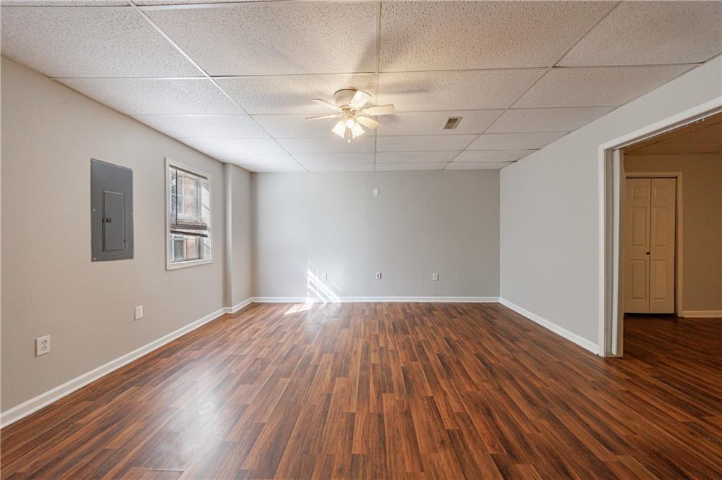 6790 Palace Lane Fairburn, GA 30213 - Photo 54 of 62 a view of an empty room with wooden floor