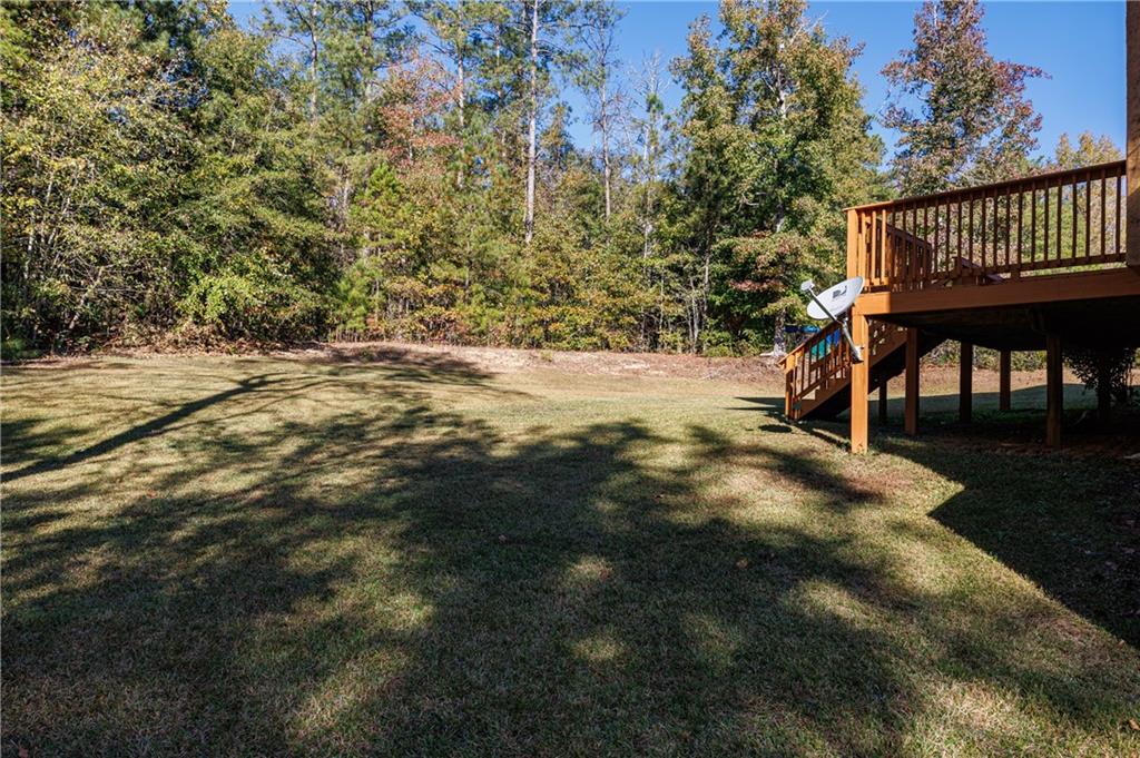 6790 Palace Lane Fairburn, GA 30213 - Photo 60 of 62 a view of a backyard with sitting area