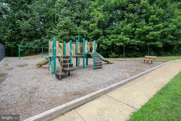 a view of a park with swings
