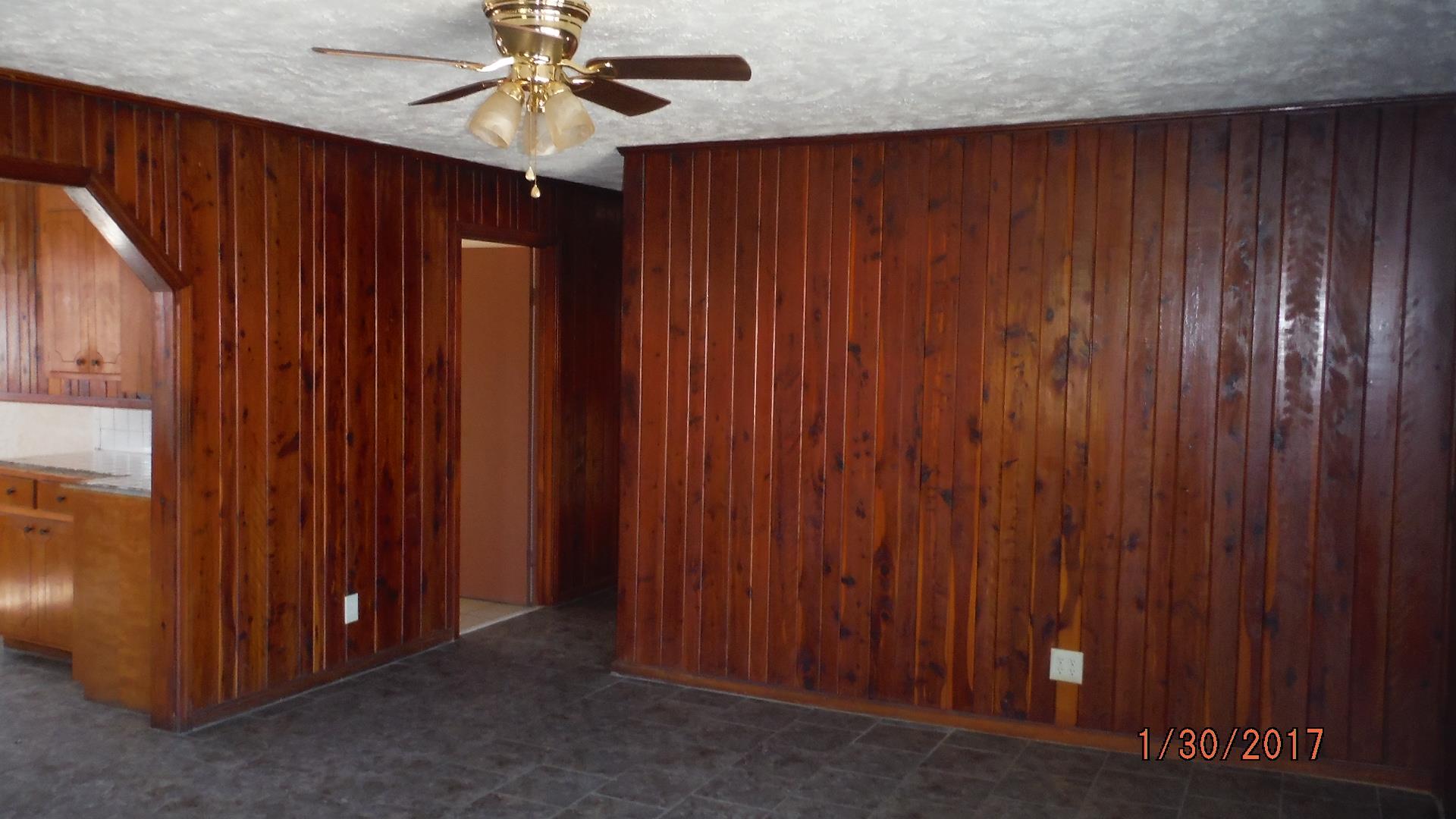 8852 Pinewood Road Lyles, TN 37098 - Photo 13 of 14 an empty room with a window and a fan