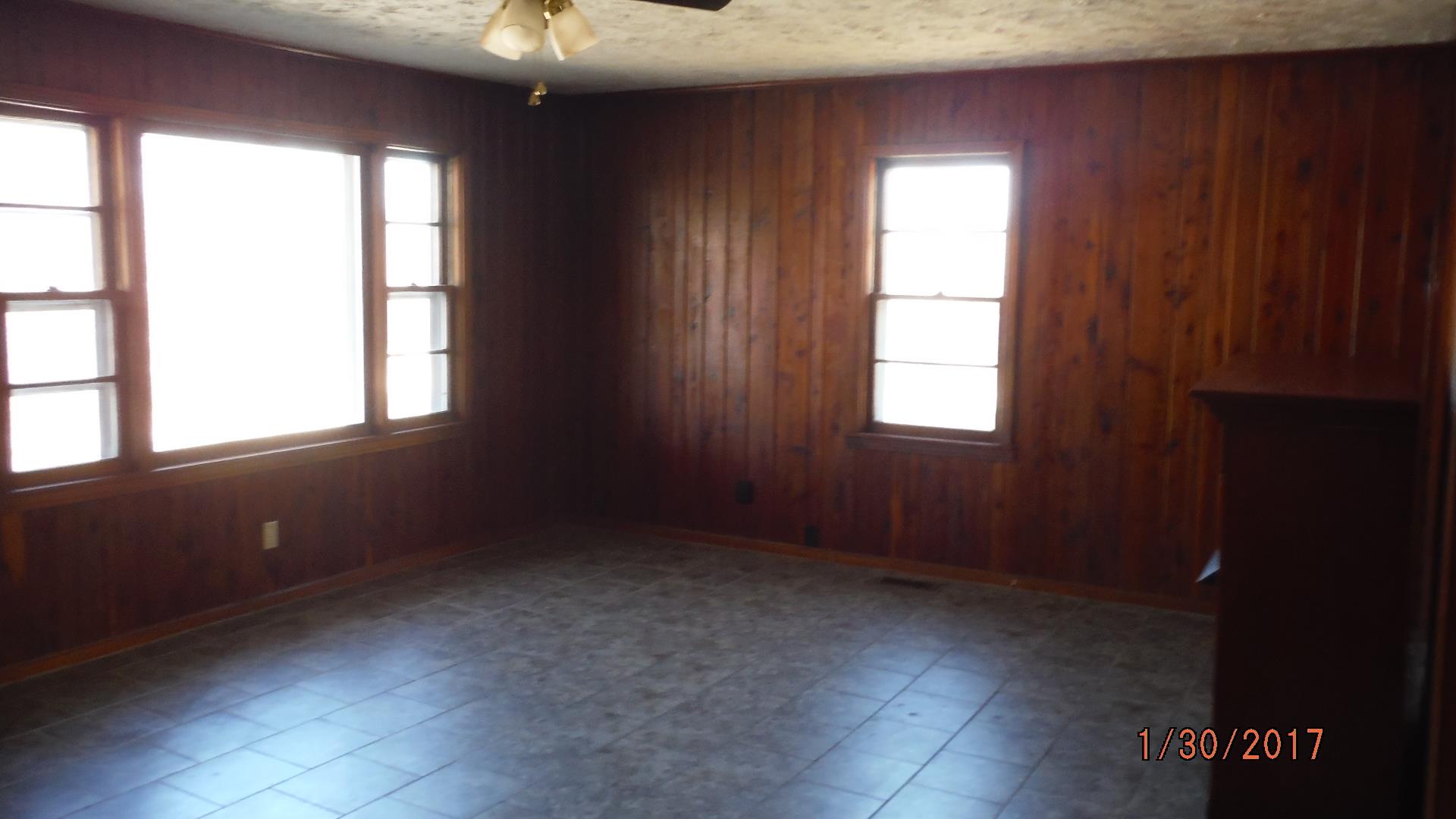 8852 Pinewood Road Lyles, TN 37098 - Photo 14 of 14 an empty room with a window