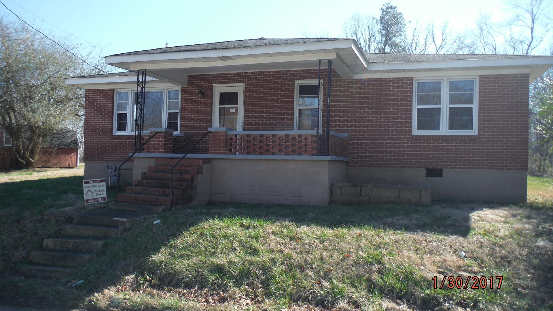 8852 Pinewood Road Lyles, TN 37098 - Photo 4 of 14 a view of a house with a yard