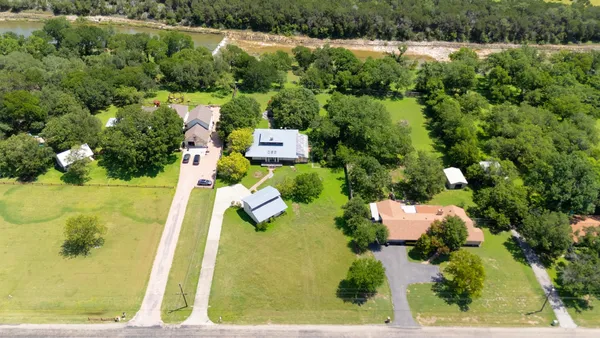 a view of house with yard